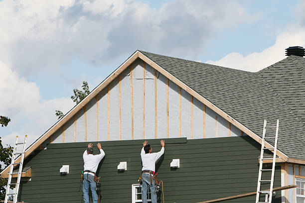 Professional Siding Repair technician working in Staley, NC